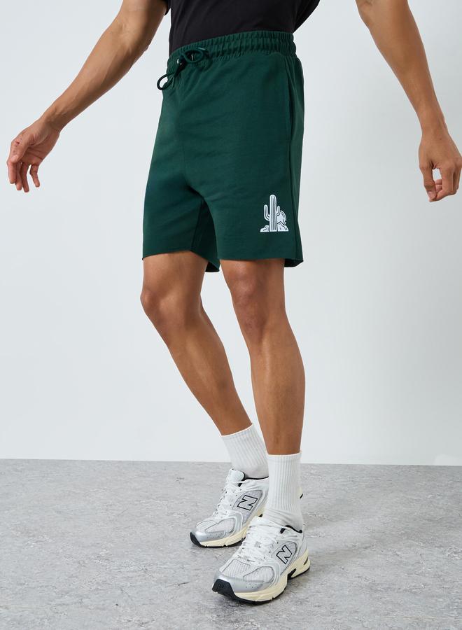 Styli Men Green Printed Regular Fit Shorts - Image 1